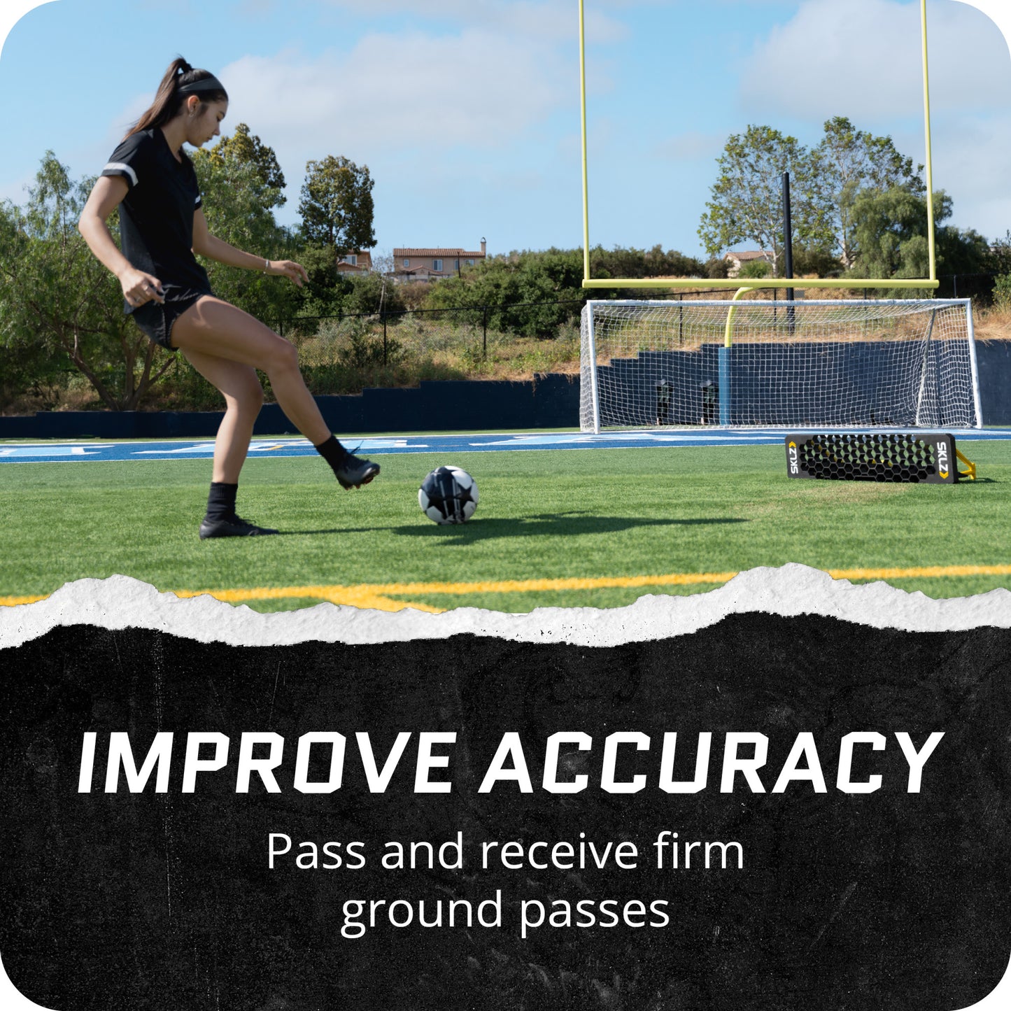 Player kicks football on field to practice passing and receiving skills outdoors