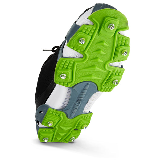 Running shoe sole features cleats for traction on a white background.