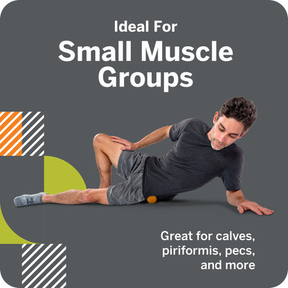 Man uses small ball for muscle relief on side, against a gray background.